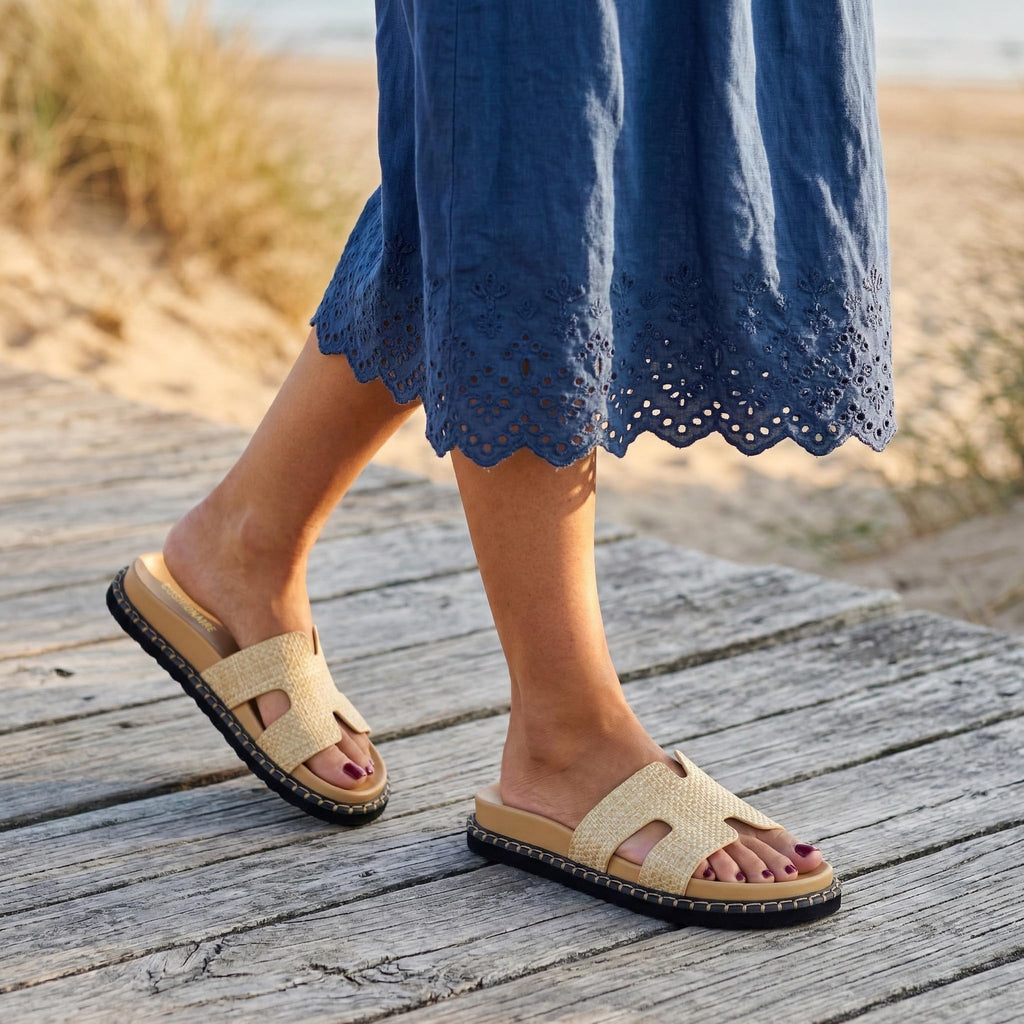 CUSHIONAIRE Crisp Women’s Slide Sandal – Faux Leather Cutout Slip-On with Artisan Stitching & Memory Foam, Wide Widths Available, NATURAL 10