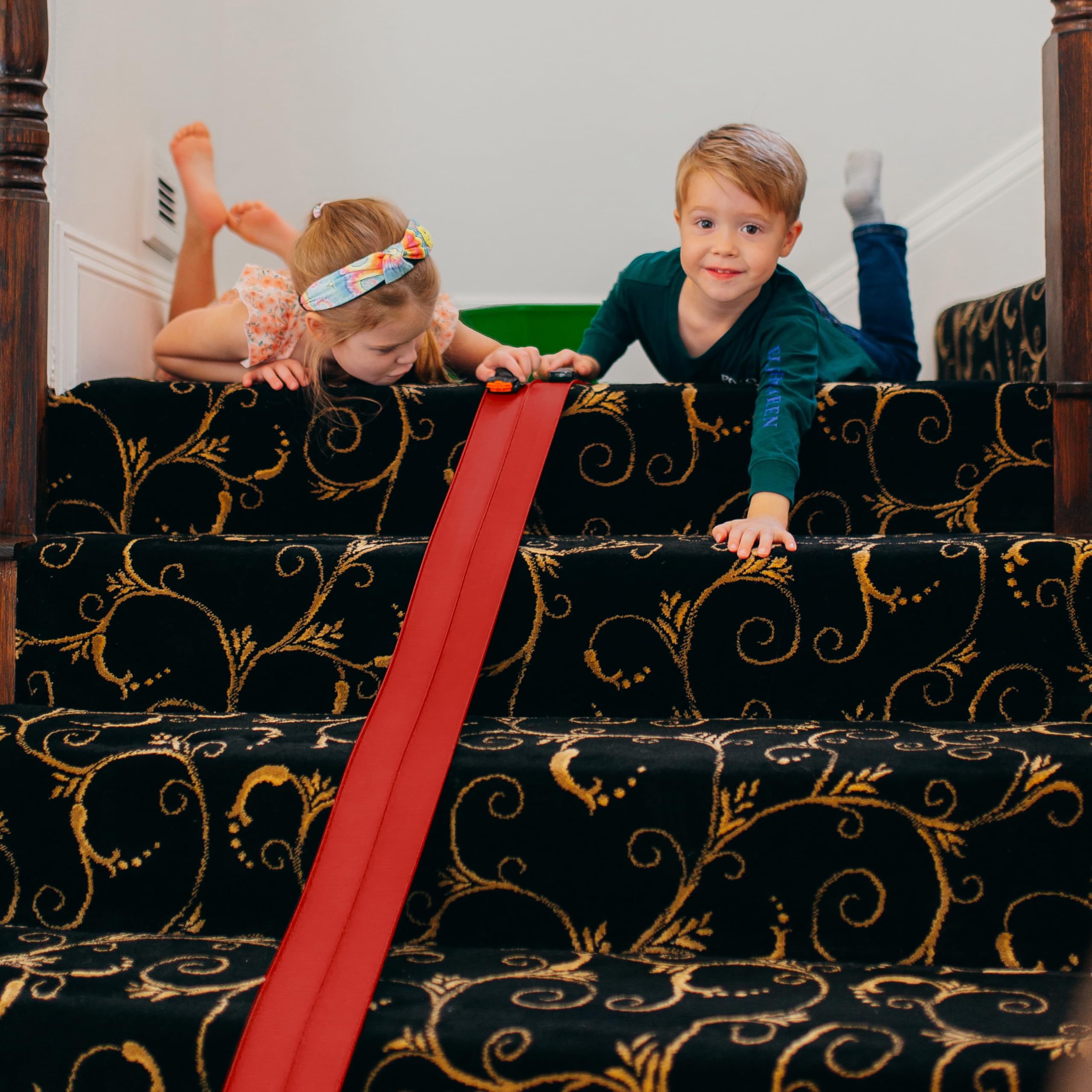 Valchemist FlexTrack 5000 Flexible Race Car Track for Kids Toy with Suction Cups Compatible with Hot Wheels and Diecast 1/64th Cars and More 15 Feet Long Rolls Up Portable Racetrack (Rocket Red)