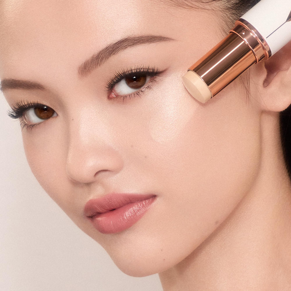 Charlotte Tilbury Unreal Skin Tint & Sheer Glow Hydrating Foundation Stick - Cream Foundation Makeup with Sheer-to-Light Coverage & a Buildable Formula - Blurring, Smoothing & Nourishing - 1 Fair