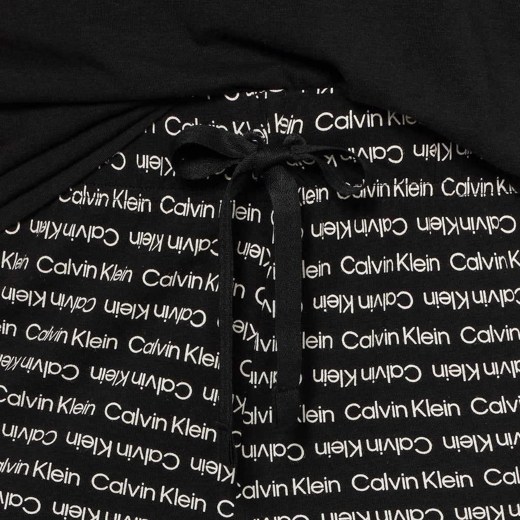 Calvin Klein Women's Refresh Short Sleeve T-Shirt & Shorts 2-Piece Pajama Set (US, Alpha, Small, Regular, Regular, Black)