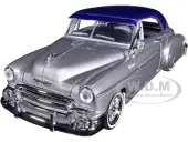 1950 Chevrolet Bel Air Lowrider Silver Metallic with Blue Metallic Top ""Get Low"" Series 1/24 Diecast Model Car by Motormax