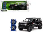 2021 Ford Bronco Badlands Black ""Rigid"" with Extra Wheels ""Just Trucks"" Series 1/24 Diecast Model Car by Jada