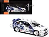 Ford Escort WRC 7 Juha Kankkunen - Juha Repo 2nd Place ""RAC Rally"" (1998) 1/18 Diecast Model Car by IXO Models