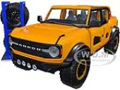 2021 Ford Bronco Orange Metallic with Extra Wheels ""Just Trucks"" Series 1/24 Diecast Model Car by Jada