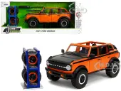 2021 Ford Bronco Open-Top Orange with Black Stripes and Hood with Extra Wheels ""Just Trucks"" Series 1/24 Diecast Model Car by Jada