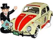 1963 Volkswagen Beetle Yukon Yellow with ""Monopoly"" Graphics ""Free Parking"" and Mr. Monopoly Resin Figure 1/18 Diecast Model Car by Auto World
