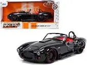1965 Shelby Cobra 427 S/C Black with Matt Black and Red Stripes and Red Interior ""Bigtime Muscle"" Series 1/24 Diecast Model Car by Jada