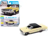 1964 Ford Galaxie 500 XL Sunshine Yellow with Black Top ""Vintage Muscle"" Series 1/64 Diecast Model Car by Auto World