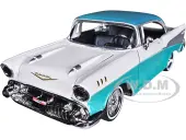 1957 Chevrolet Bel Air Lowrider Turquoise Metallic and White ""Get Low"" Series 1/24 Diecast Model Car by Motormax