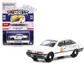 1990 Ford Taurus Police White ""Utah Highway Patrol"" ""Hot Pursuit"" Series 41 1/64 Diecast Model Car by Greenlight