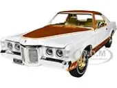 1969 Pontiac Royal Bobcat Grand Prix Model J Cameo White with Firefrost Gold Hood and Top with Gold Interior ""American Muscle"" Series 1/18 Diecast Mo
