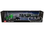 Peterbilt 389 with 48"" Mid-Roof Sleeper and Polar Deep Drop Trailer Green and Silver 1/64 Diecast Model by DCP/First Gear