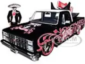 1985 Chevrolet C-10 Pickup Truck Black with White Top and Graphics with Charro Man Diecast Figure ""Tapatio"" 1/24 Diecast Model Car by Jada