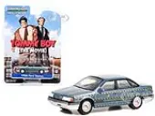 1986 Ford Taurus Blue Metallic ""Zalinsky Auto Parts"" Crash Test Vehicle ""Tommy Boy"" (1995) Movie ""Hollywood Series"" Release 38 1/64 Diecast Model Car