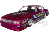 1986 Chevrolet Monte Carlo SS Lowrider Pink Metallic with Graphics ""Lowriders"" Series 1/24 Diecast Model Car by Maisto