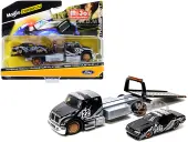 International DuraStar Flatbed Truck 22 and 1988 Ford Mustang LX 22 Matt Black with Gray Graphics ""Toyo Tires"" ""Elite Transport"" Series 1/64 Diecast